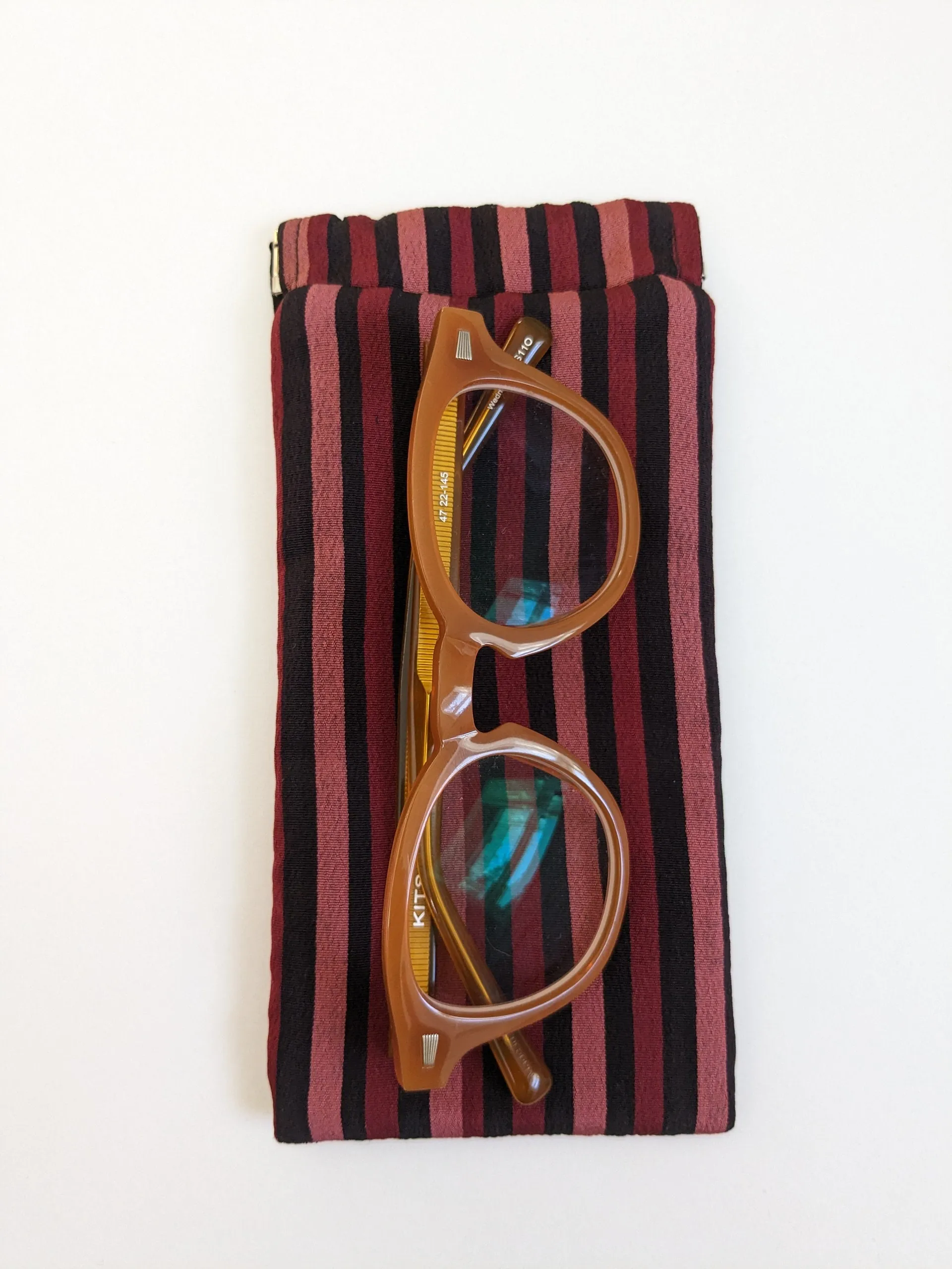 Red and black stripe glasses case